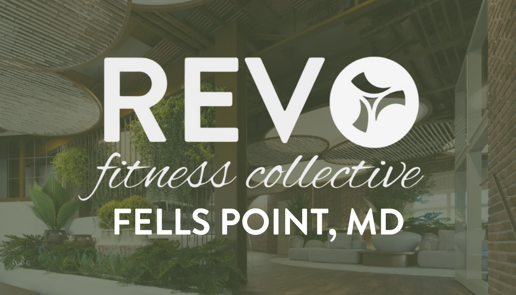 Photo displays the title REV Fitness Collective and it's location in Fells Point Maryland. The background photo is a view of the lobby, which enters into their studio space.